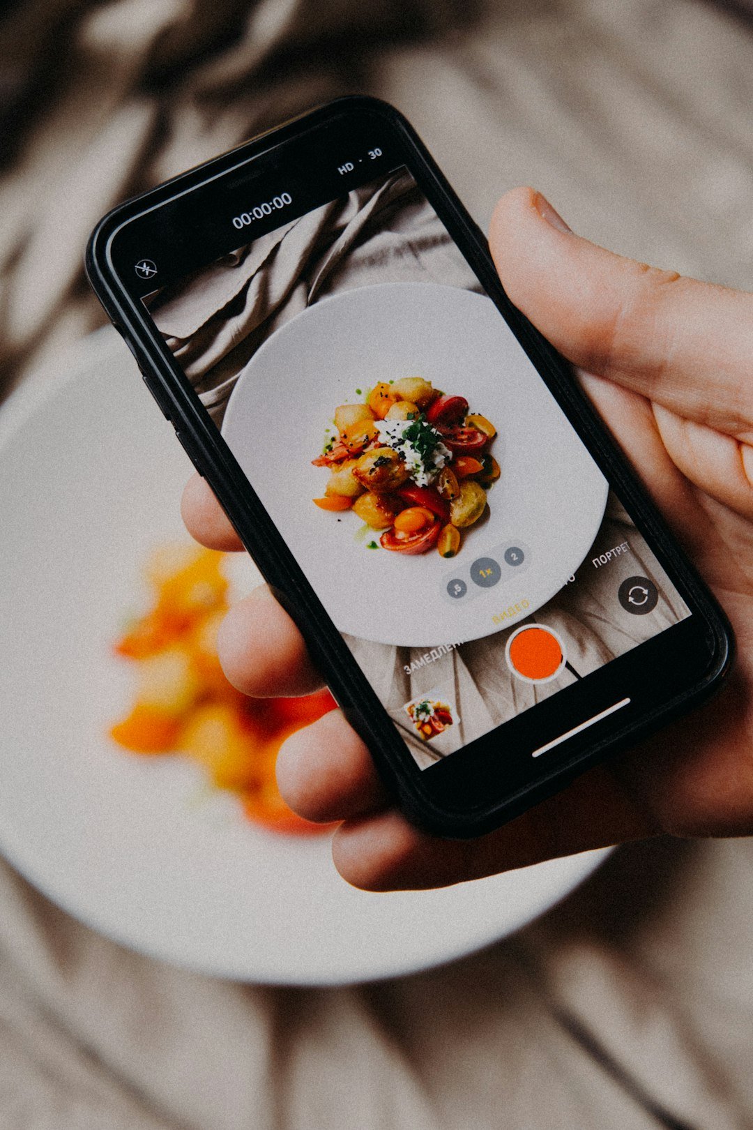 Checking a weight loss CGM app on a smartphone