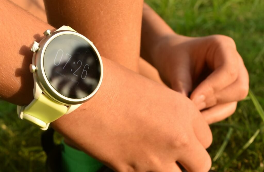 Close up of a person wearing a budget fitness tracker