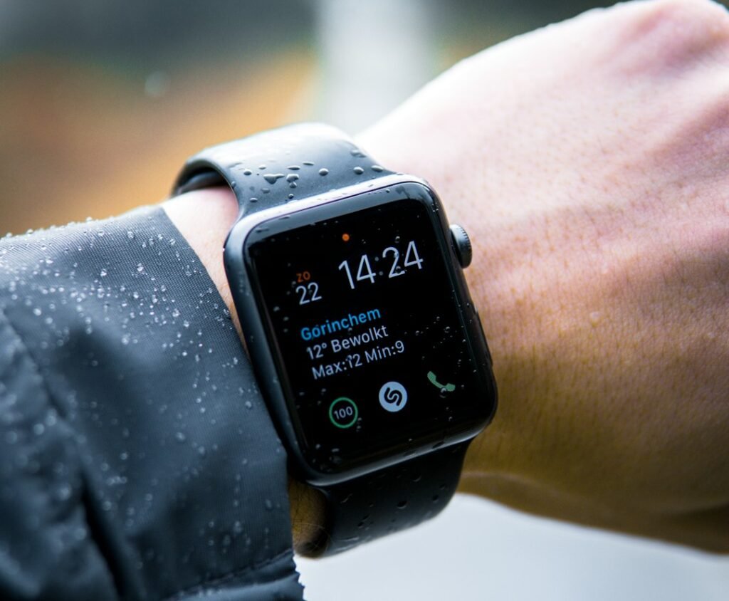 Person checking health data on a smartwatch