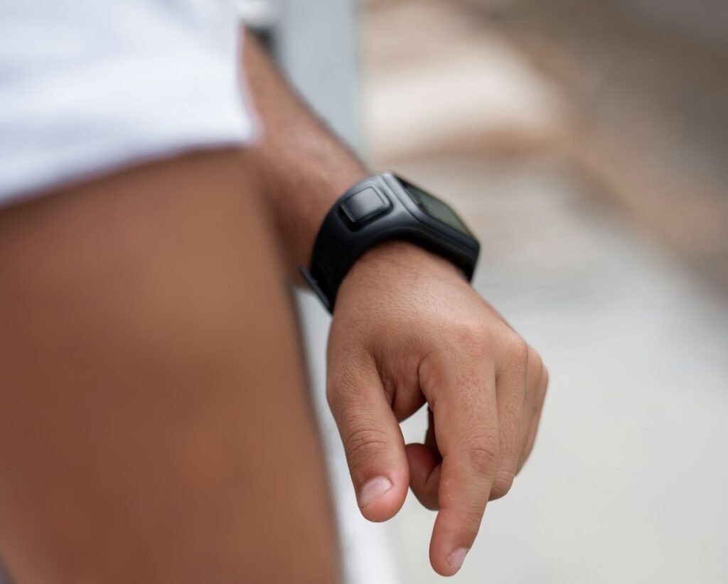 Runner checking Garmin watch during a run