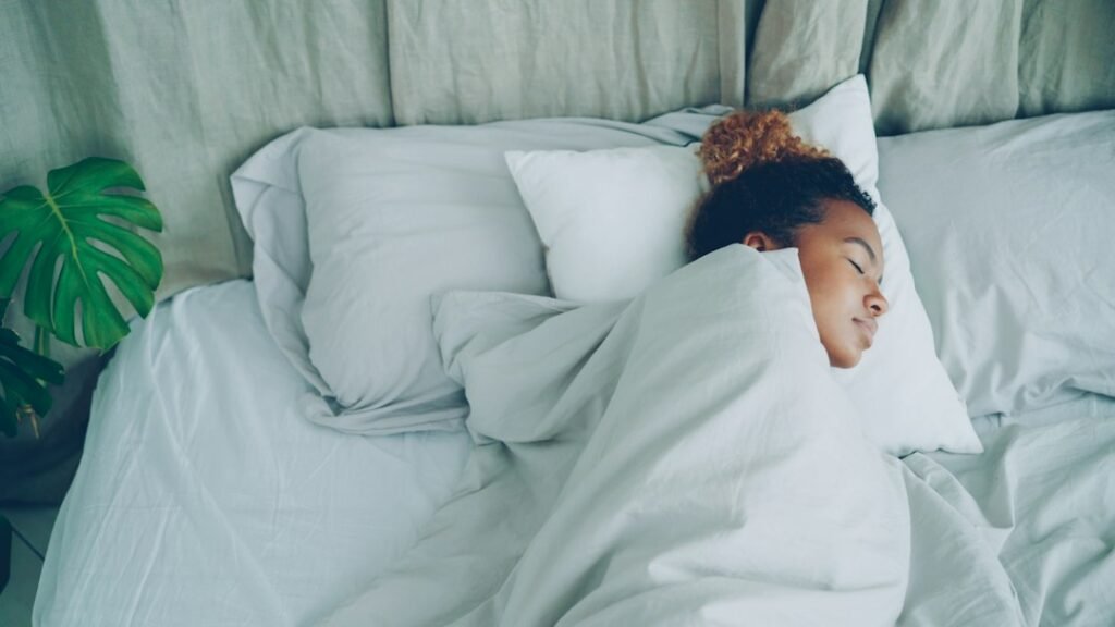 Woman sleeping peacefully at night, relevant to sleep apnea detection
