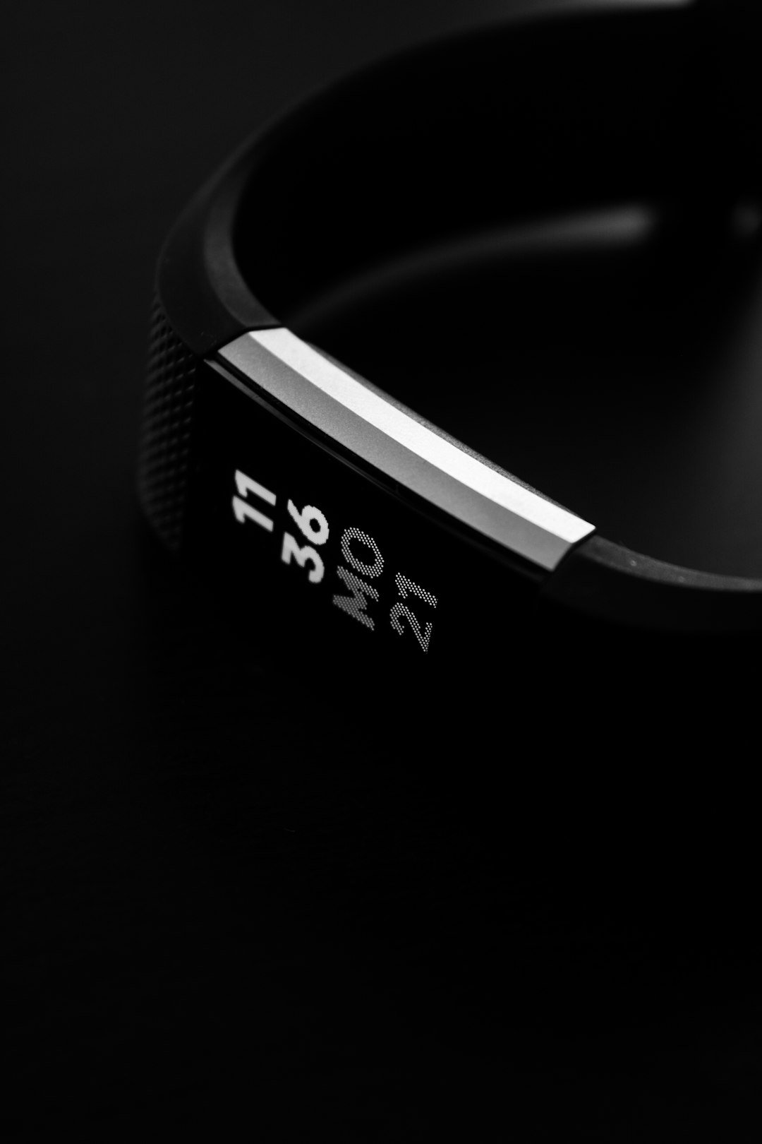 Fitness tracker displaying activity stats on wrist