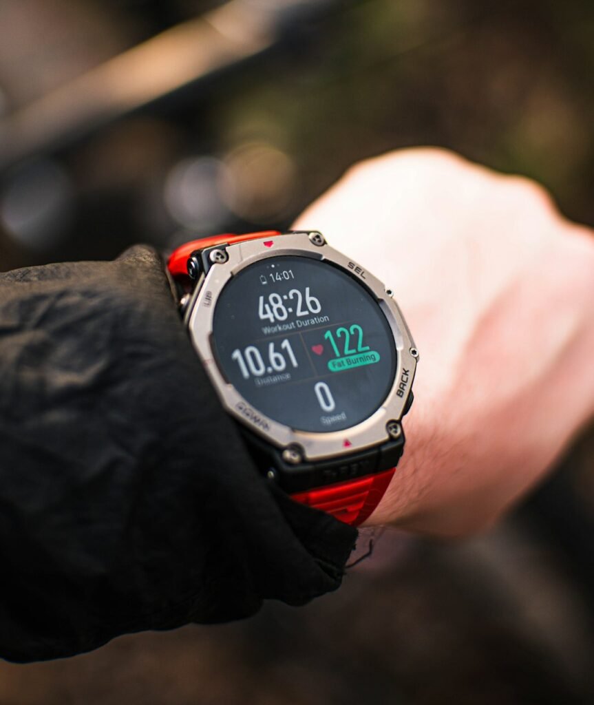 Person checking their fitness tracker during a workout
